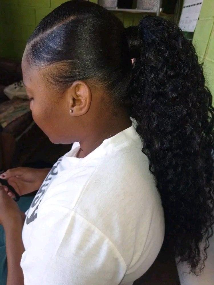 Sleek ponytail installation by RNB Beauty Treat